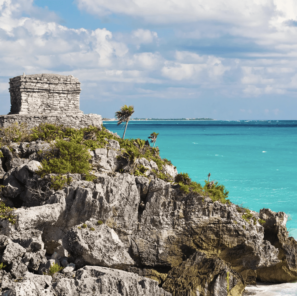 Maya ruins of Tulum on cliffs overlooking the Caribbean Sea